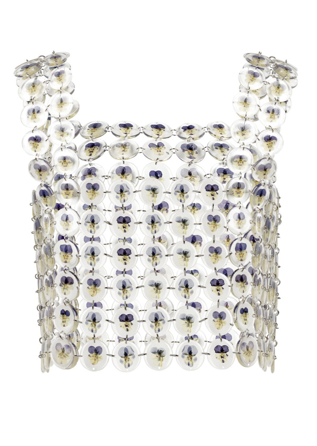 our new floral chainmaille is a distinctive technique where hundreds of preserved botanicals are intricately assembled-- this top is crafted from over two hundred pansy flowers. Relaxed fit, antiqued silver toggle side closure for easy on/off.