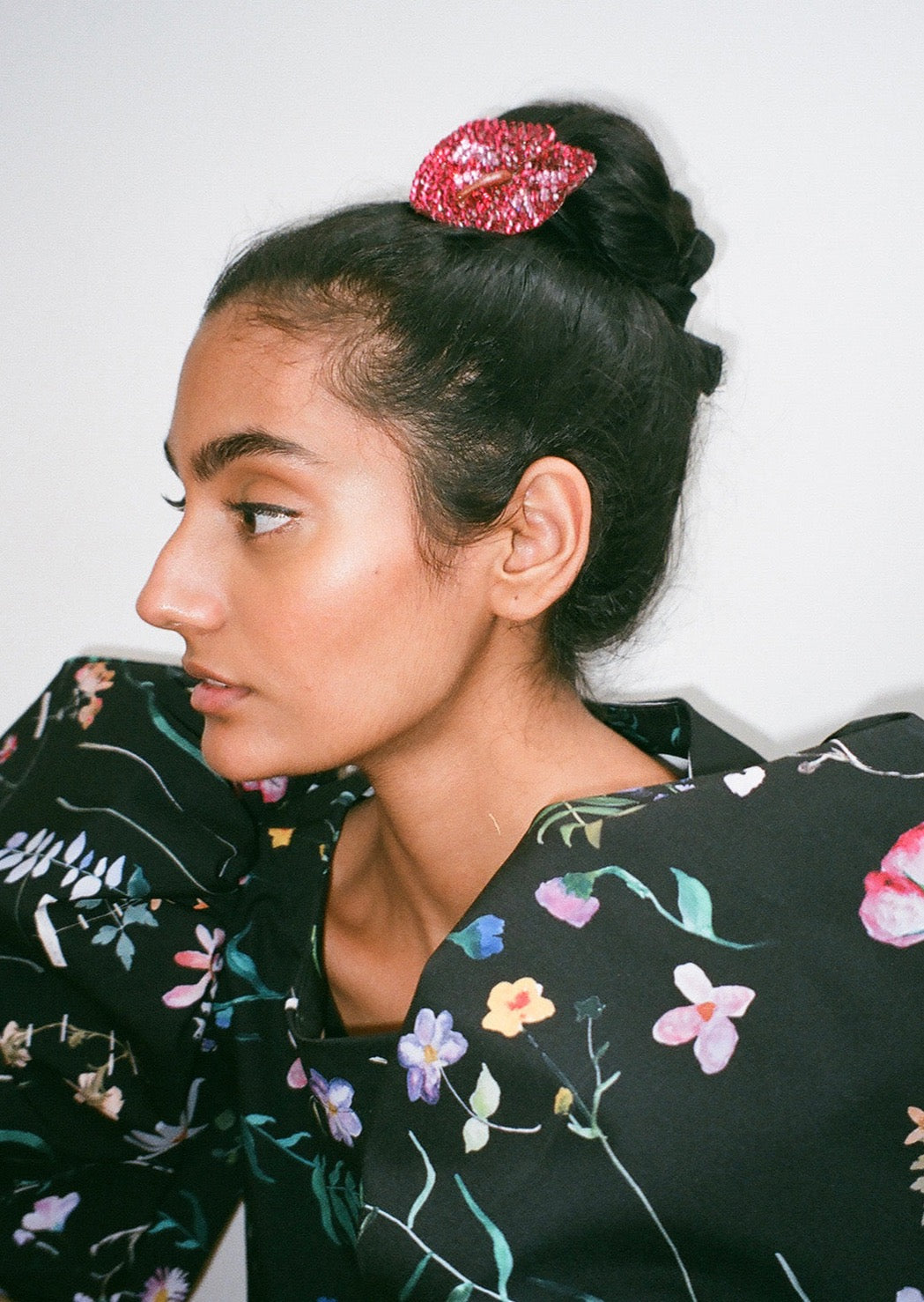 Cropped shirt with bateau neckline and voluminous mid-length bishop sleeves. Slips on. Constructed from smooth deadstock twill printed with our Scrapbook Floral print.