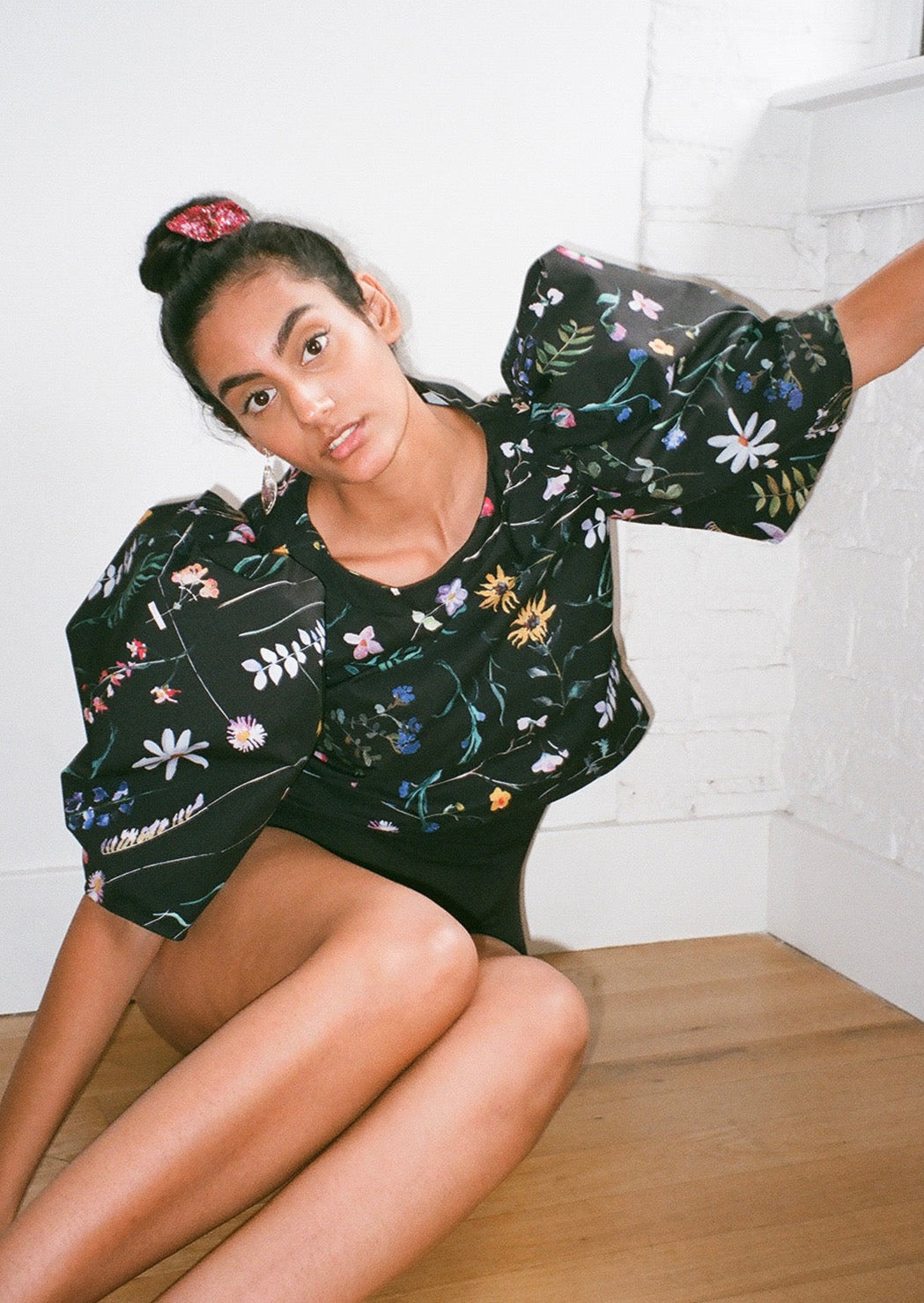 Cropped shirt with bateau neckline and voluminous mid-length bishop sleeves. Slips on. Constructed from smooth deadstock twill printed with our Scrapbook Floral print.