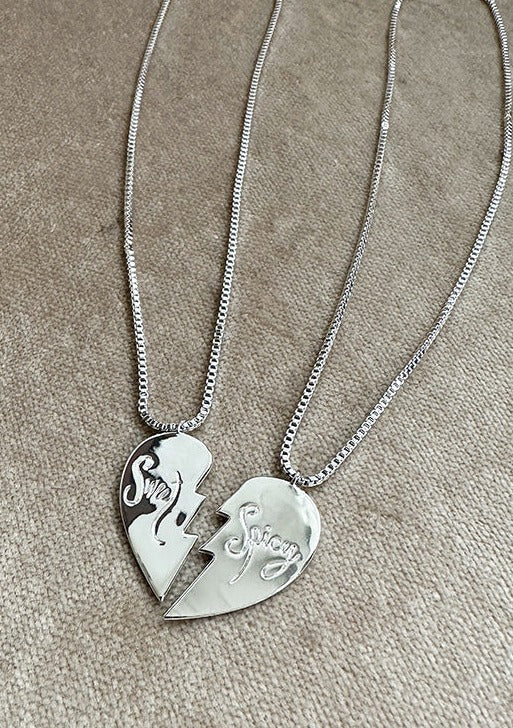 Silver Happy Hearts Necklace Pair with the words Sweet and Spicy on each heart half on thin silver chain.