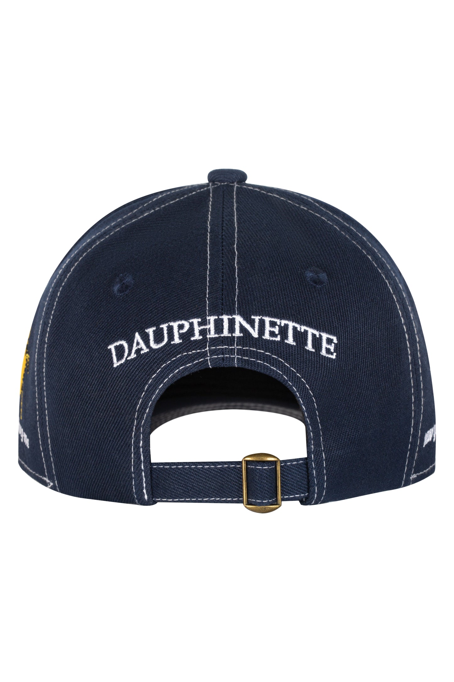 Back view of navy blue cap with "DAUPHINETTE" embroidered in white thread  on it.