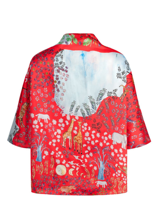 Printed in Olivia Cheng's Fever Dream, a tailor-made, satin draped mid-sleeve top. Keyhole back.