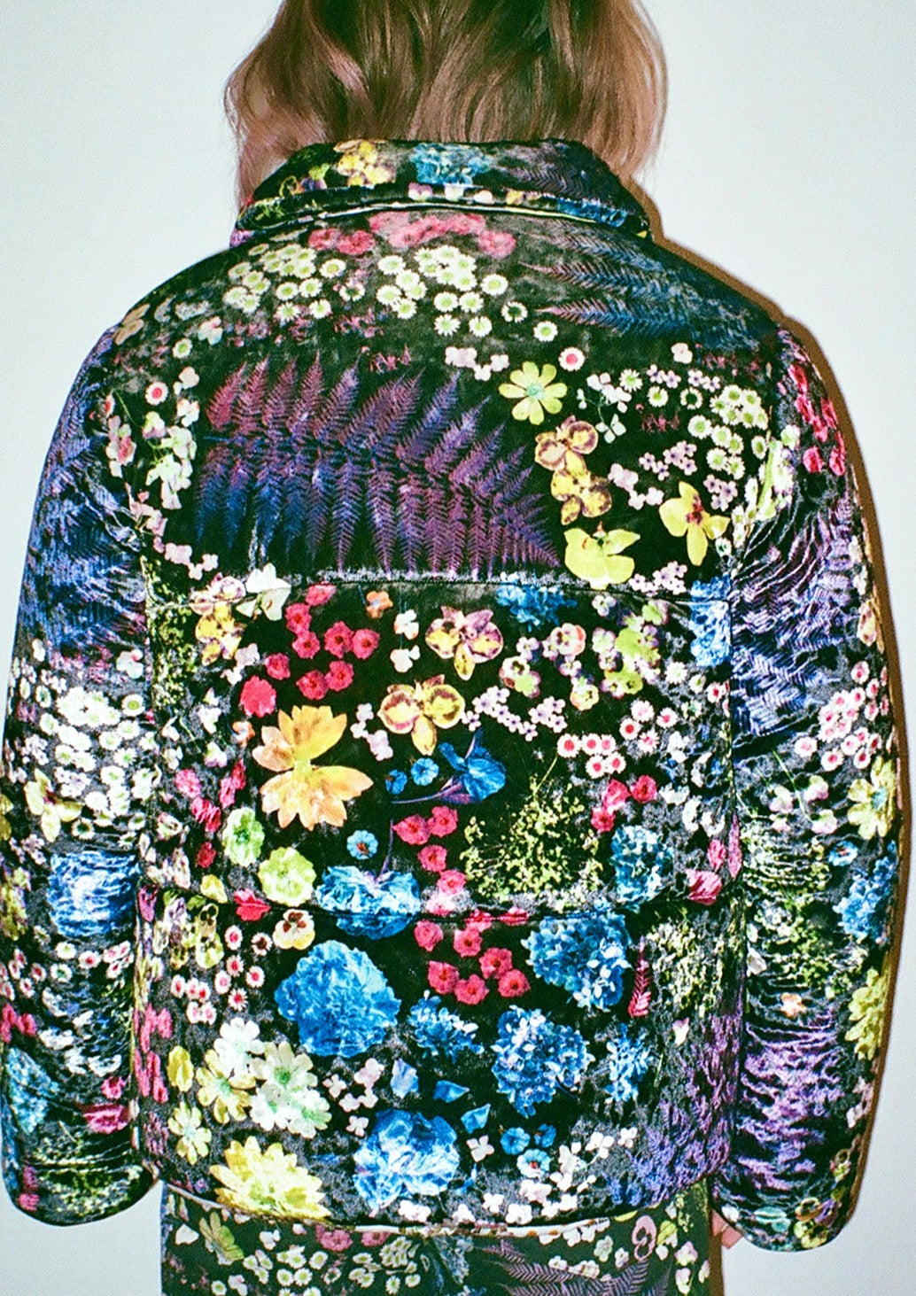 Velvet puffer jacket in multicolored Acid Potpourri print with black base color.