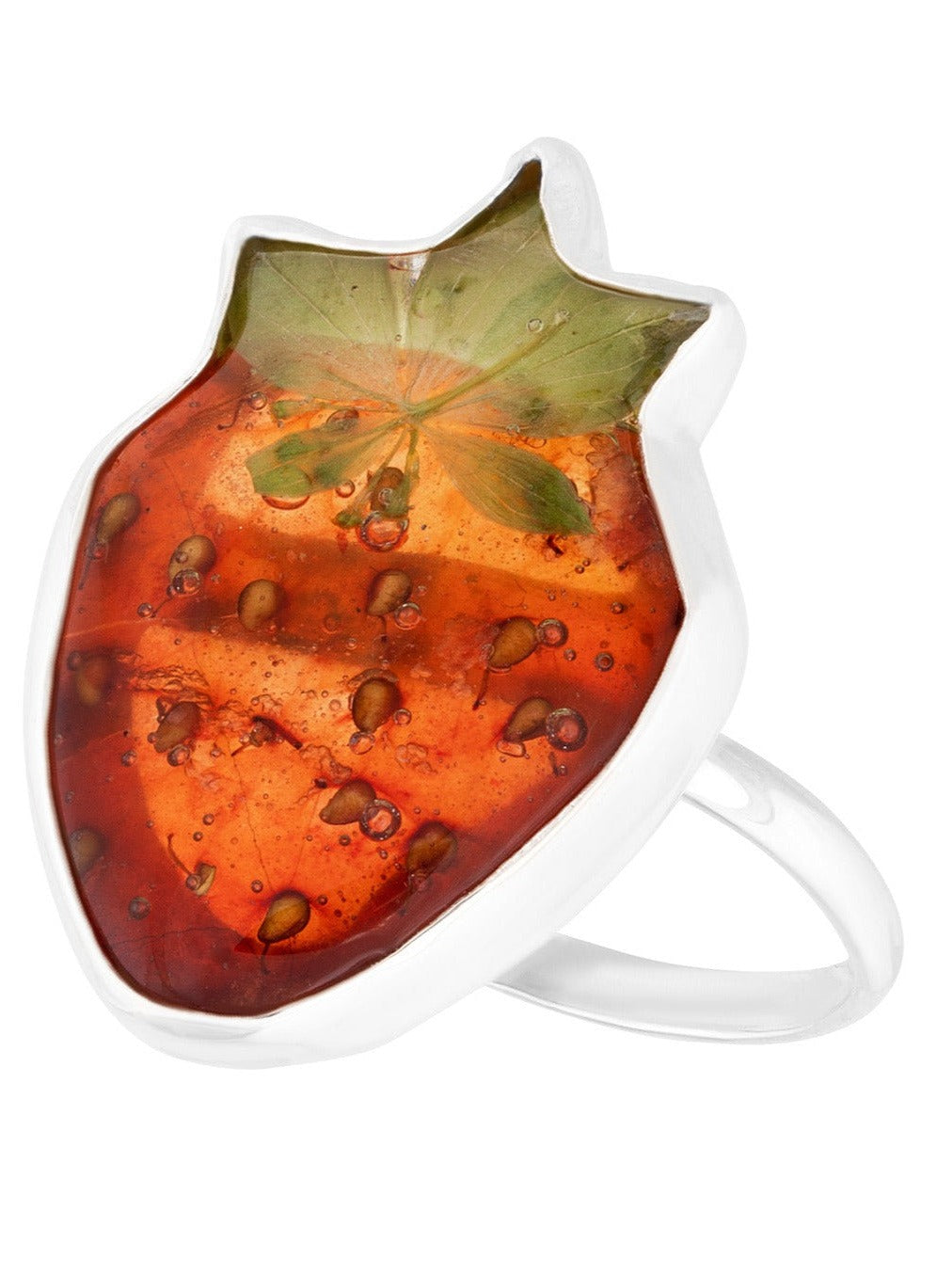 Whole strawberry preserved in resin on silver ring band.