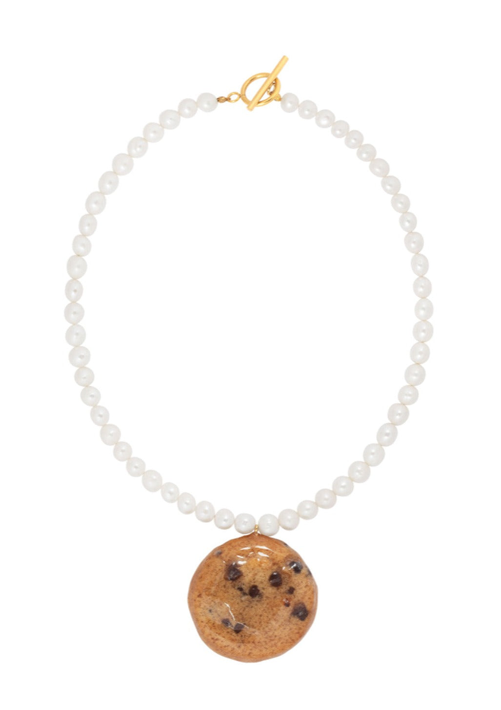 Resin coated cookie on beaded pearl necklace with gold clasp.