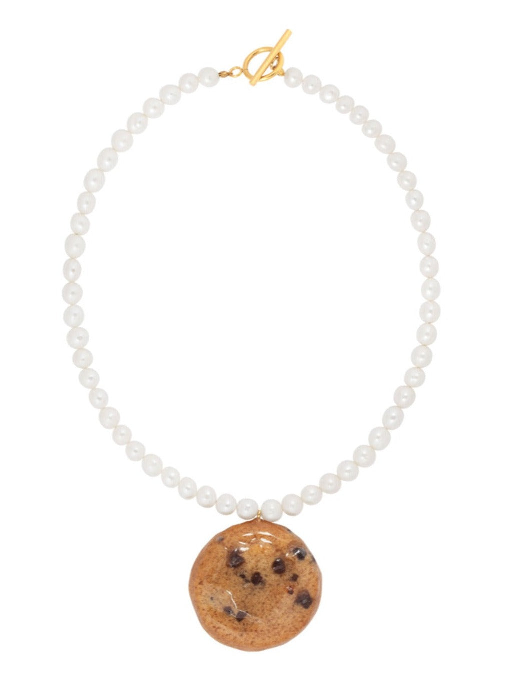 Resin coated cookie on beaded pearl necklace with gold clasp.