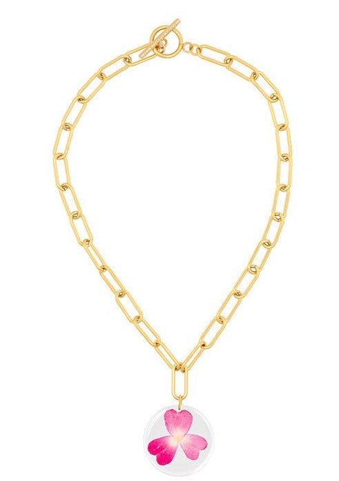 Resin rose petal chain pendant on chunky gold chain.