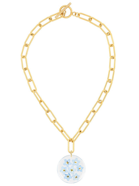 Forget Me Not flower pendant on gold chain.