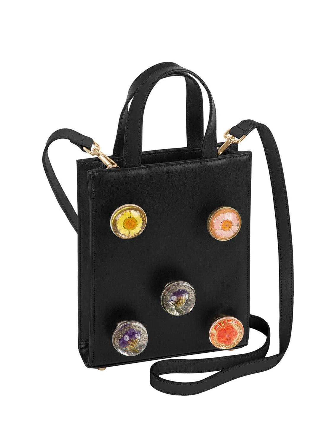 Black leather bag with 5 assorted preserved  floral knobs.