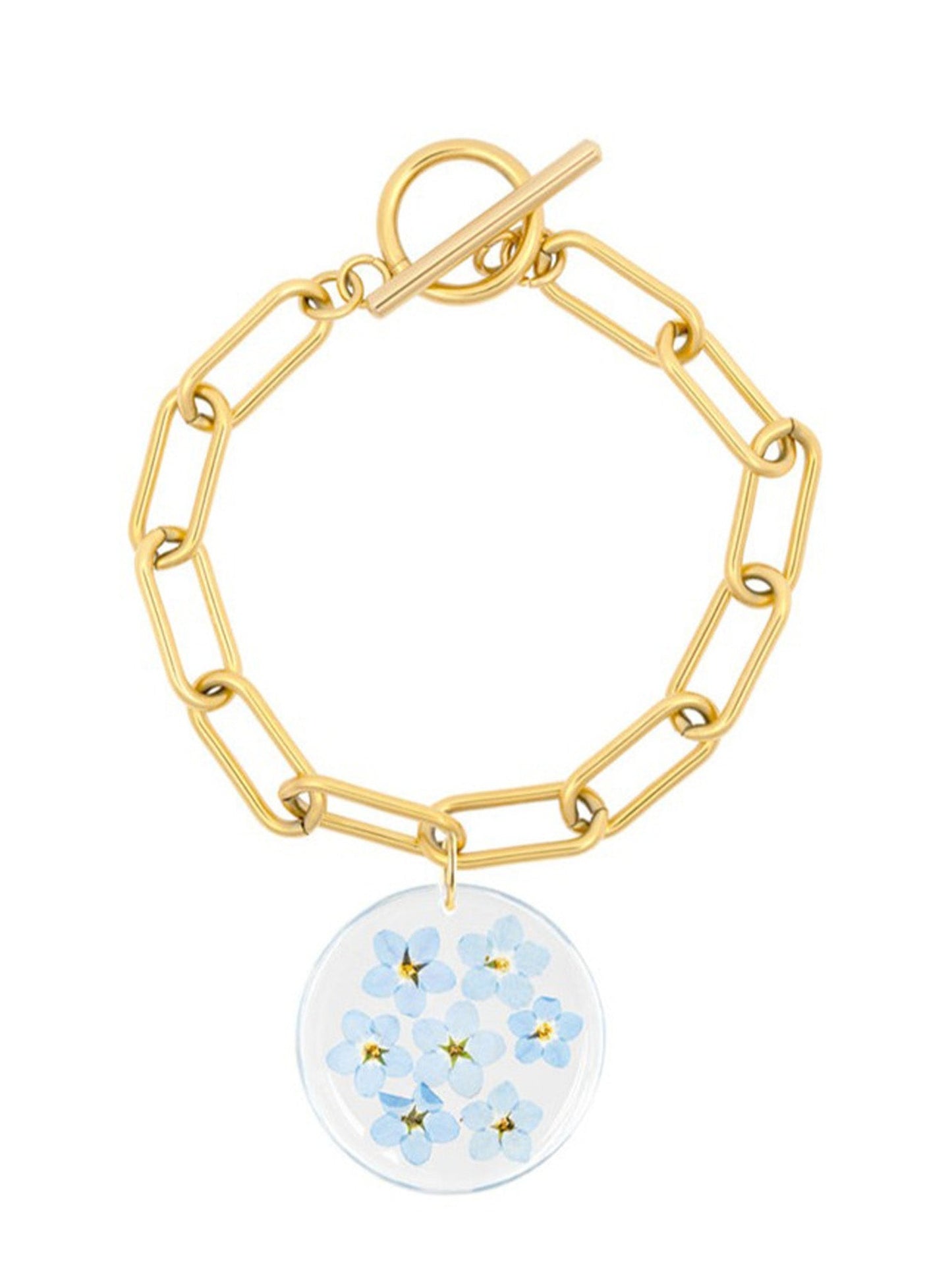 Real forget-me-not flowers suspended from a gold Albert chain with a toggle clasp