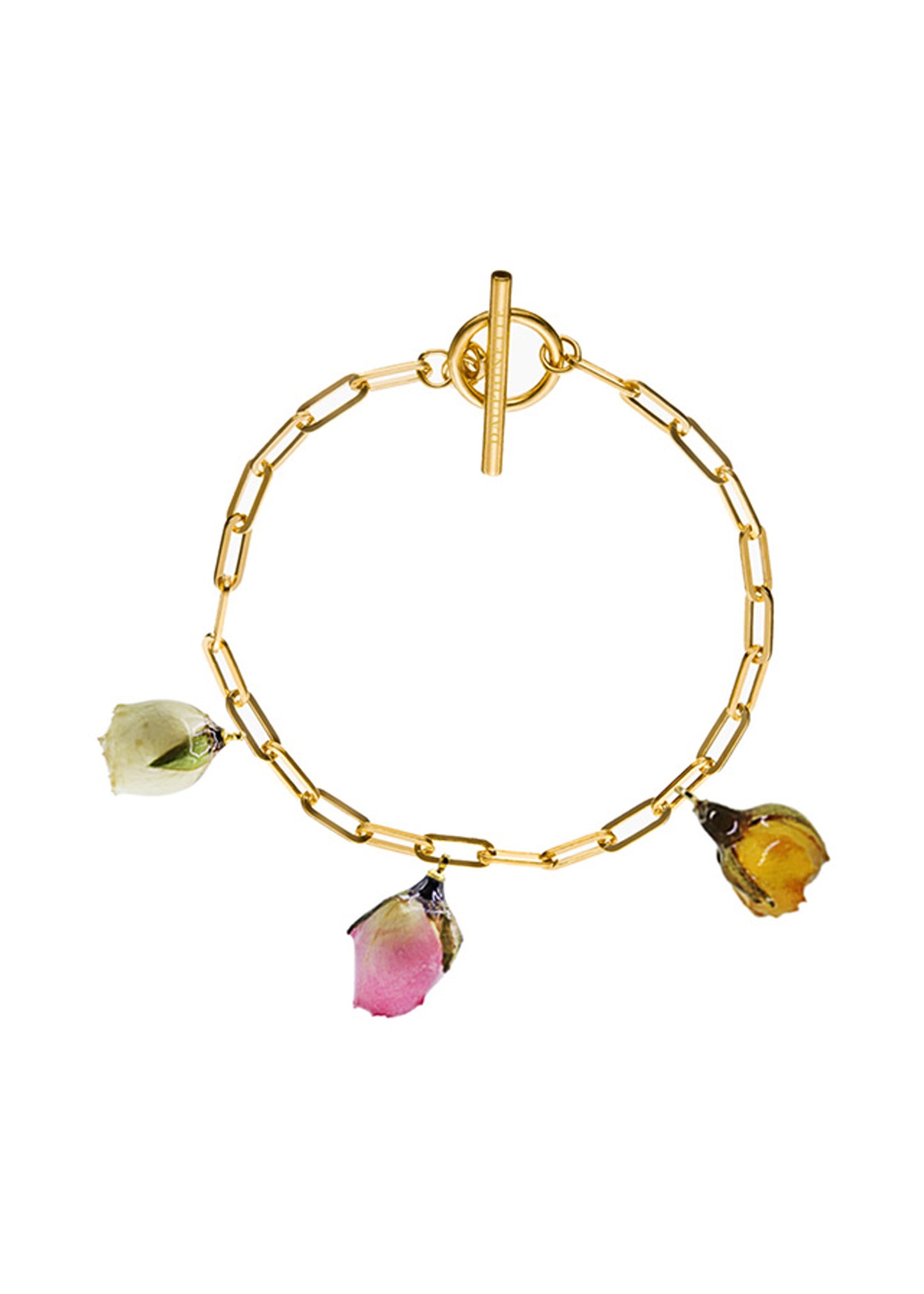 Three preserved rosebuds on a gold chain bracelet.