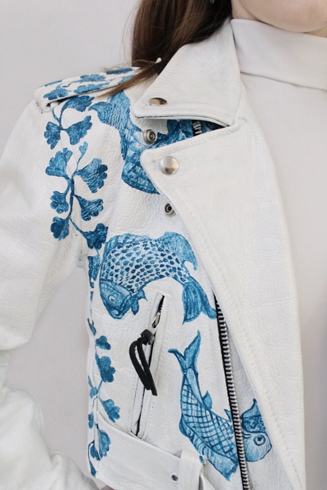 Vintage leather jacket, painted to look like an ancient blue and white vase, finished with pearlescent mica flakes for a three-dimensional sheen. 