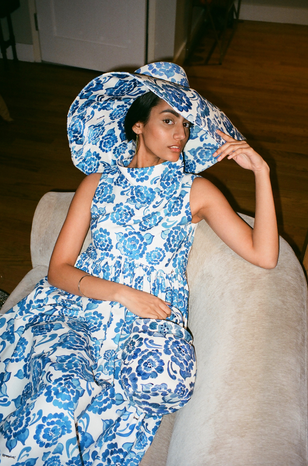 Hand-painted chinoiserie blue watercolor byproduct mini vase tote. With matching blue painted dress and wide brim hat.