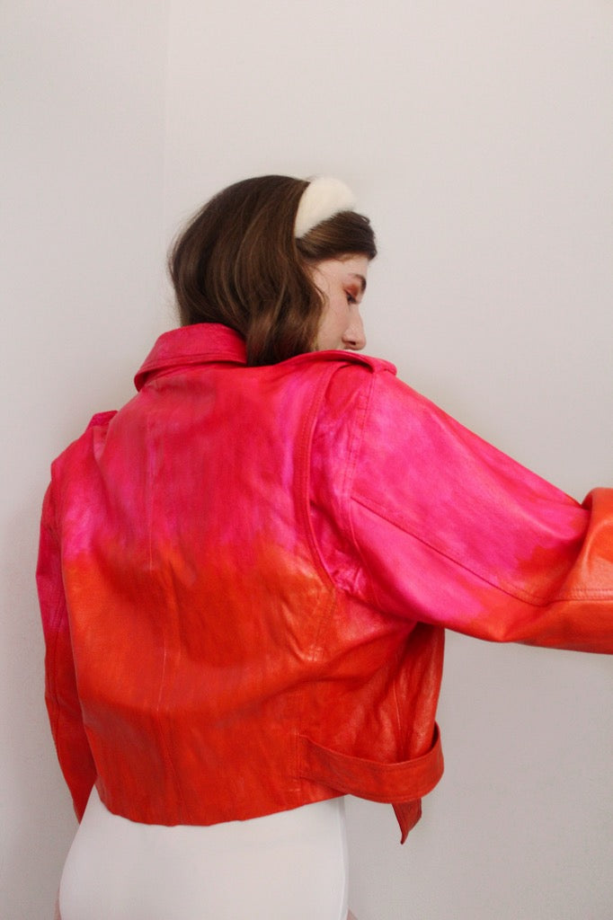 Vintage leather jacket, coated in wide strokes of red and pink paint to resemble something between a New York fire hydrant and a Rothko